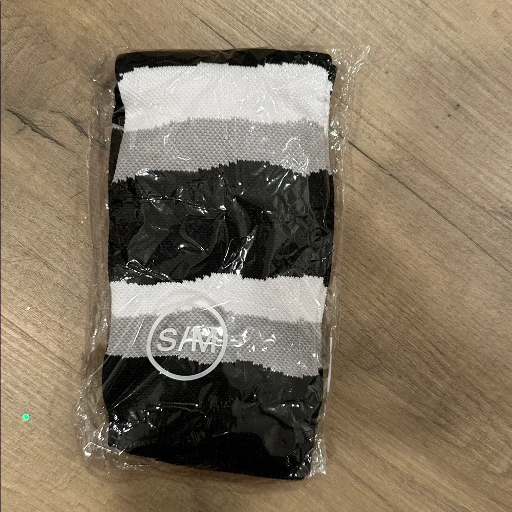 NWOT Gray, black and white stripe compression‎ socks.